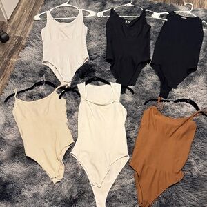 Assorted Bodysuits in Neutral Tones